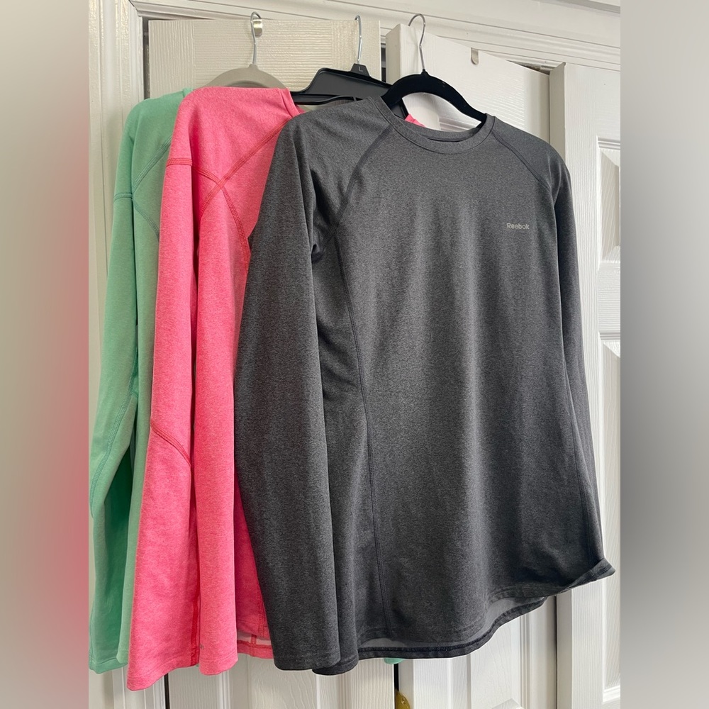 Three Reebok performance long sleeve